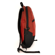 A red and black backpack shown from a side profile view against a plain white background.