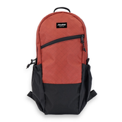 Red and black backpack with a visible brand logo on a white background