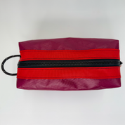 Red color block toiletry bag 