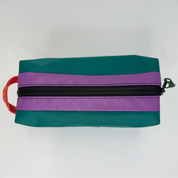 Teal and purple color block toiletry bag 
