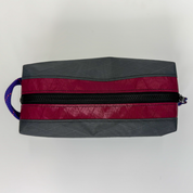 Grey and red color block toiletry bag 