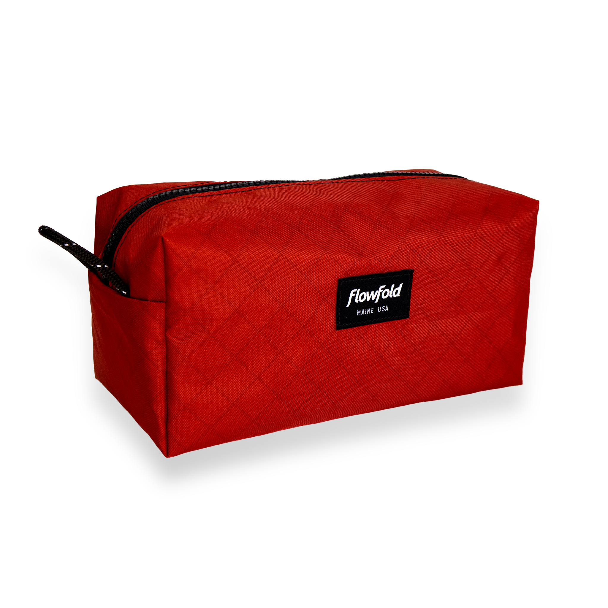 Red toiletry bag with 'flowfold' logo on a white background