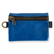 Blue leather pouch with zipper on a white background