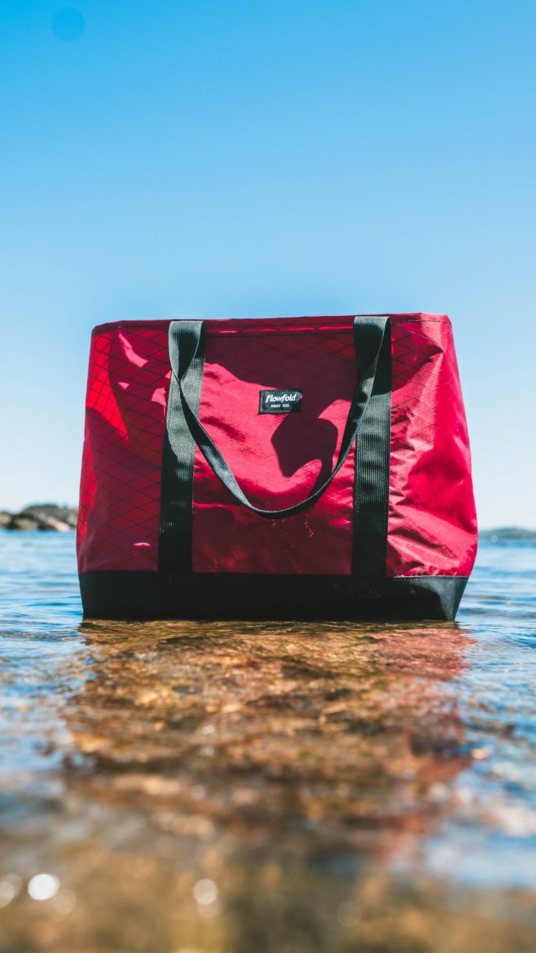 Mammoth open tote in the water at the beach