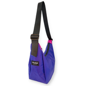 Purple crescent shaped crossbody bag