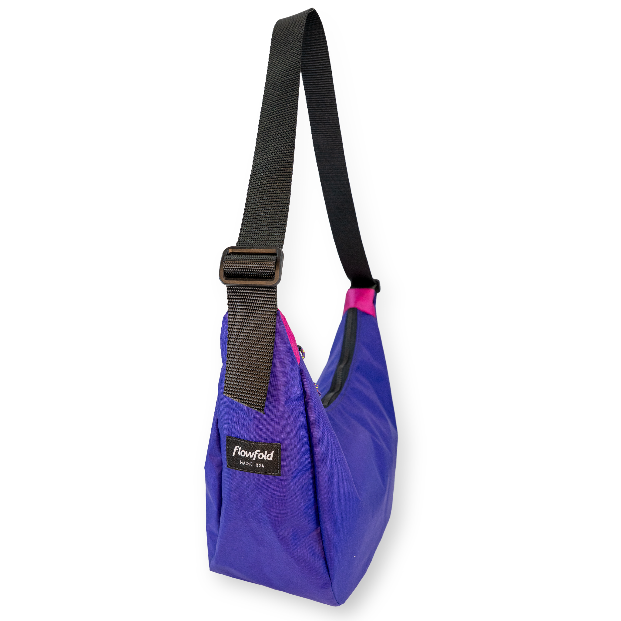 Purple crescent shaped crossbody bag