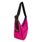Bright pink crescent shaped crossbody bag