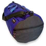 Purple 40L conductor duffle bag with black side panels and multicolor handles