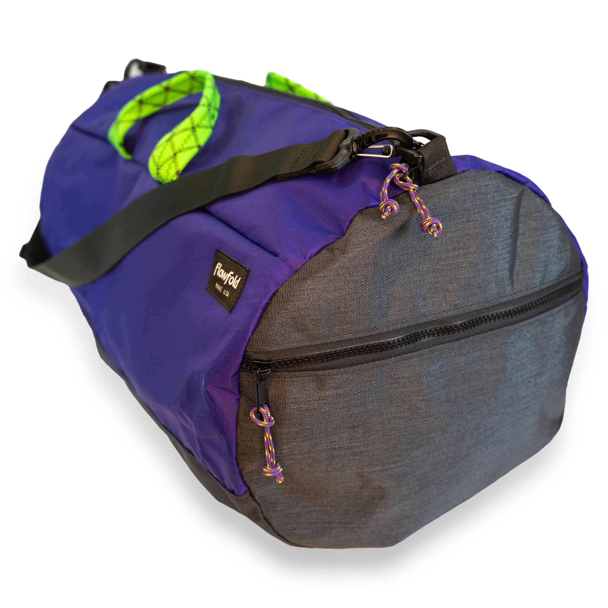 Purple 40L conductor duffle bag with black side panels and green handles