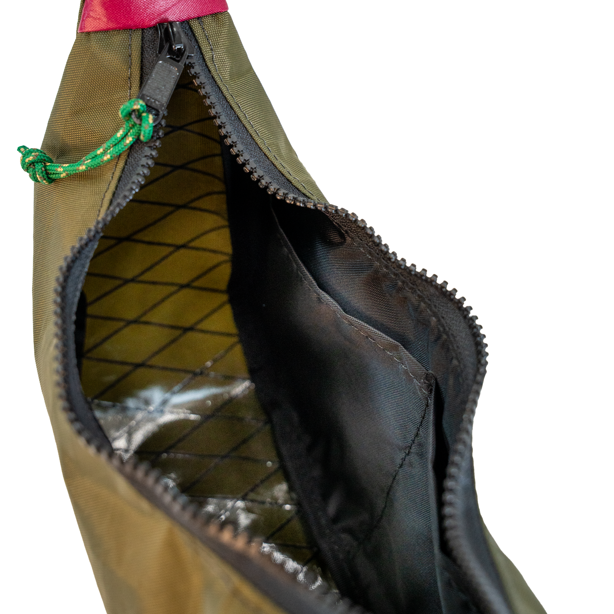 Close-up of an olive green bag with a black zipper opening, showing a black interior lining and a green drawcord detail against a white background.