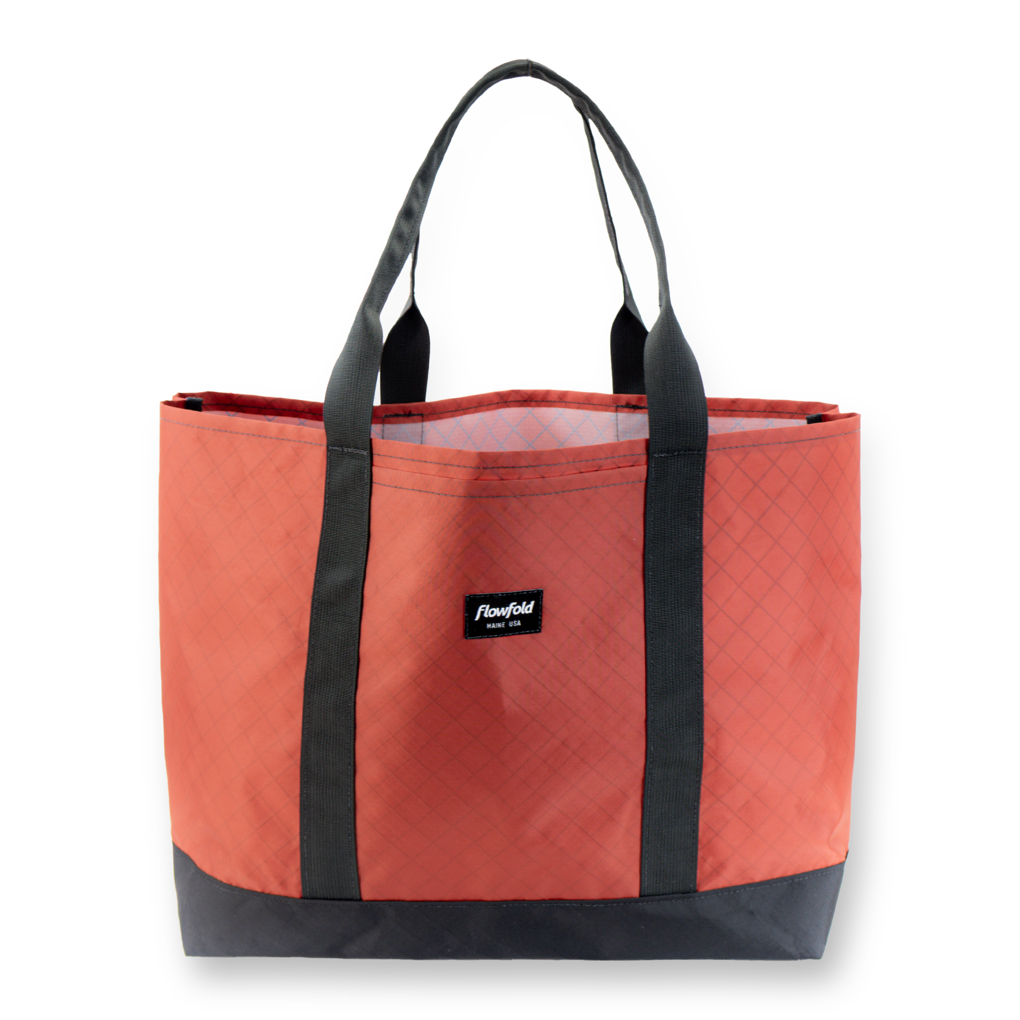Red tote bag with black handles and trim on a white background