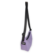 Purple crescent shaped bag with a black strap on a white background