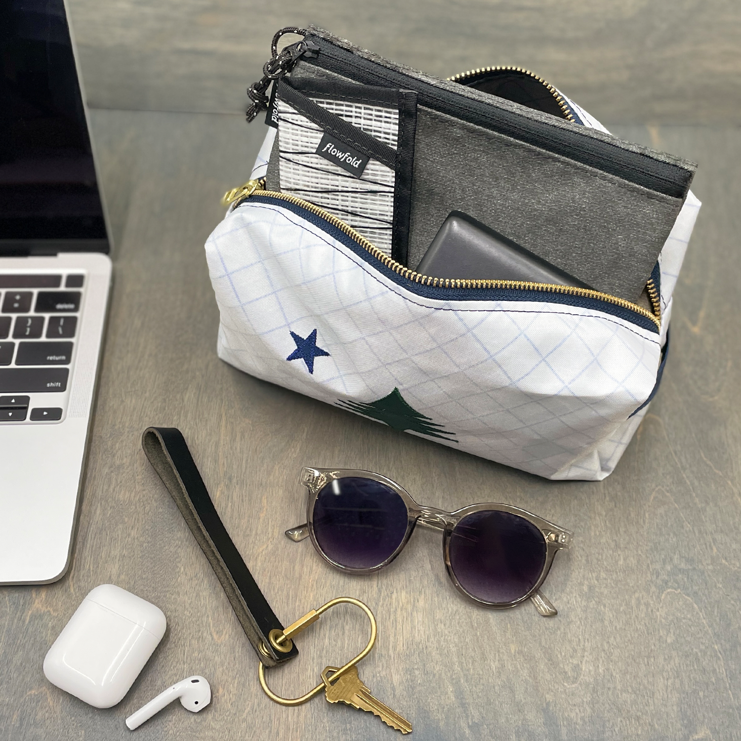 Original Maine x Flowfold White Aviator Dopp Kit Water Resistant Fabric Made in the USA, On Wood with Tech Gear