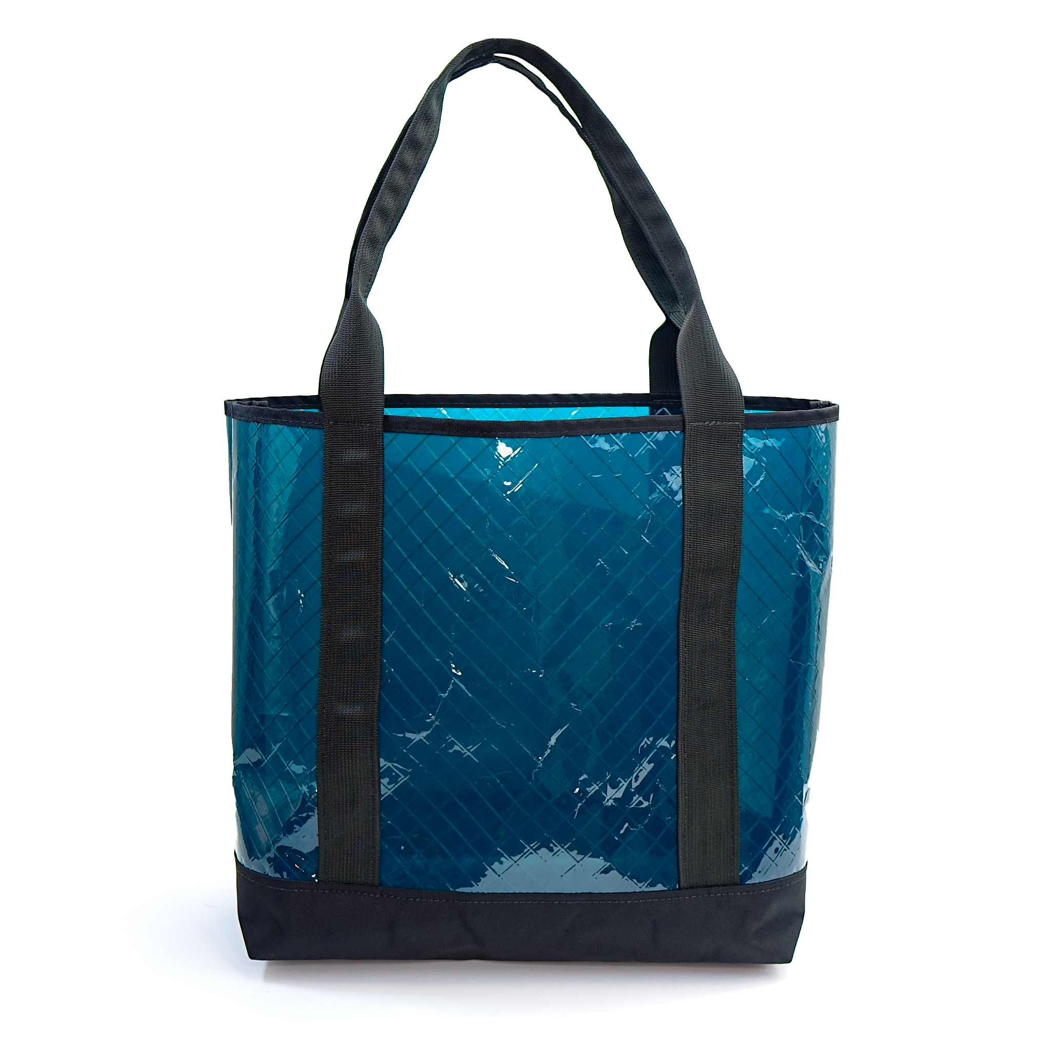 Blue sailcloth tote bag with black handles on a white background
