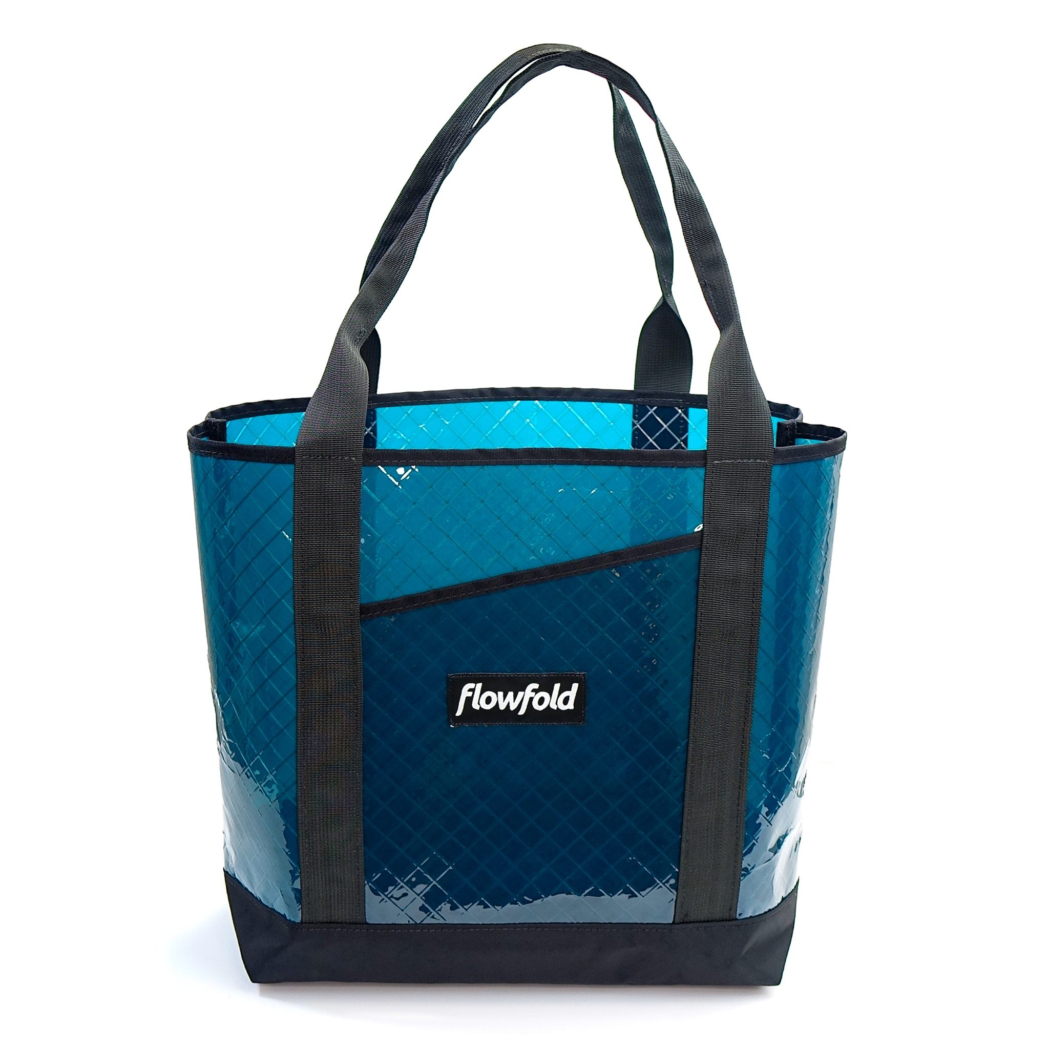Jade sailcloth tote bag with black handles and trim on a white background, featuring the 'Flowfold' brand.