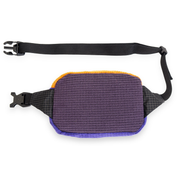 Back angle of a blue and purple fleece grid belt bag with black strap on a white background