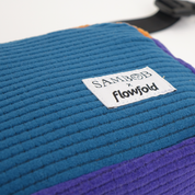 Blue and purple textured pouch with 'Sambob x Flowfold' label on a white background