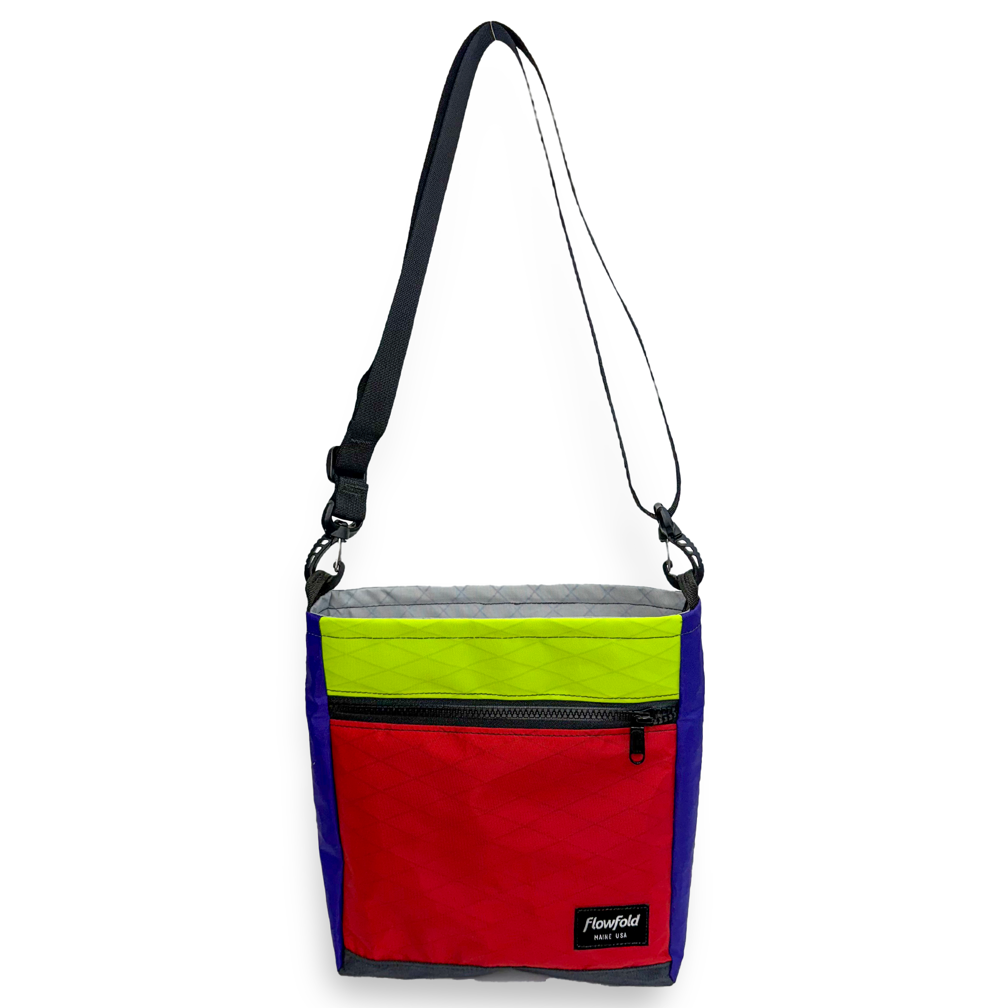 Red, yellow, and blue color block crossbody bag with a black strap